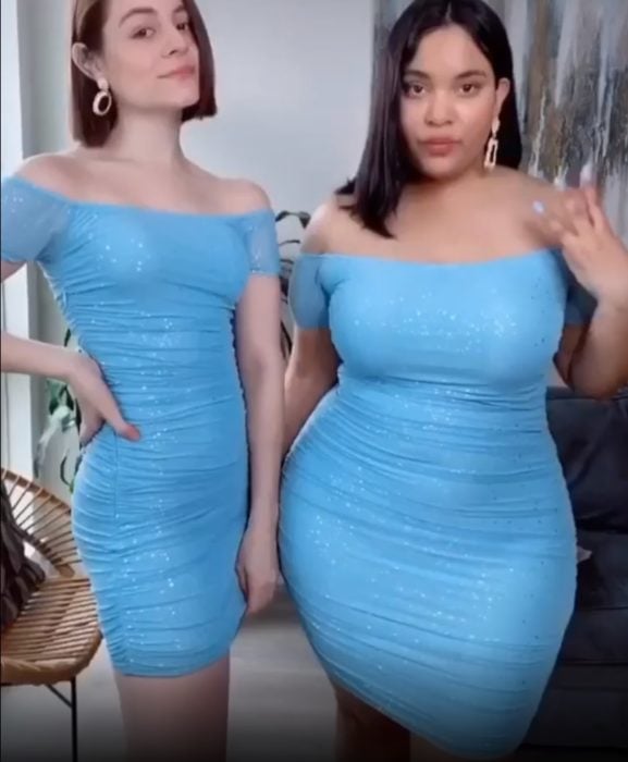 Maria y Denise usando un vestido azul cielo pegado