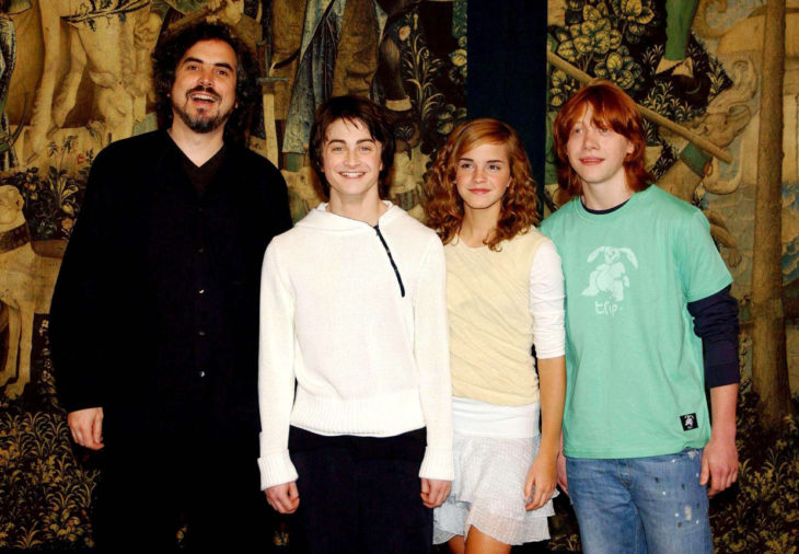 De izquierda a derecha: Alfonso Cuarón, Daniel, Radcliffe, Emma Watson y Rupert Grint durante las filmaciones de 'Harry Potter y el prisionero de Azkabán'