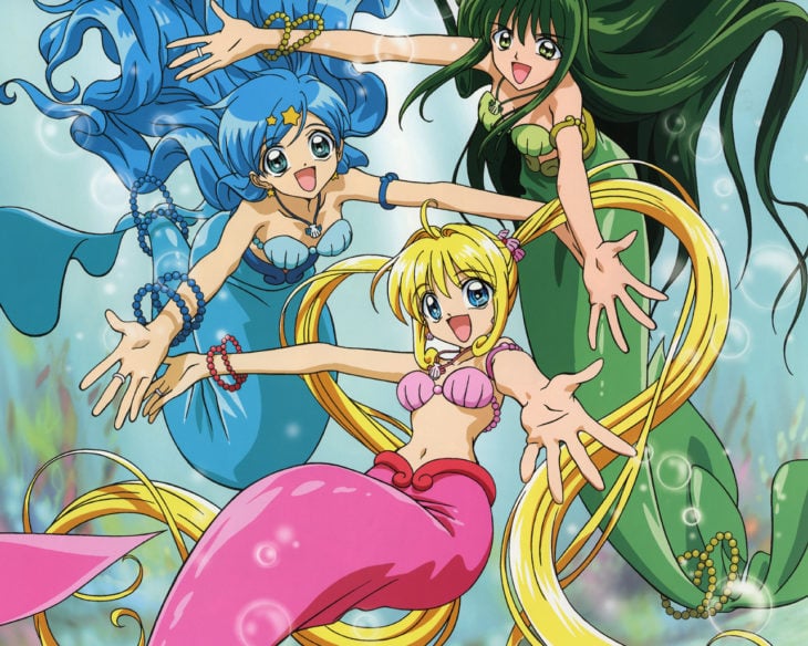Escena de la serie animada Mermaid Melody: Pichi Pichi Pitch son sirenas con colas azules, verdes y rosa