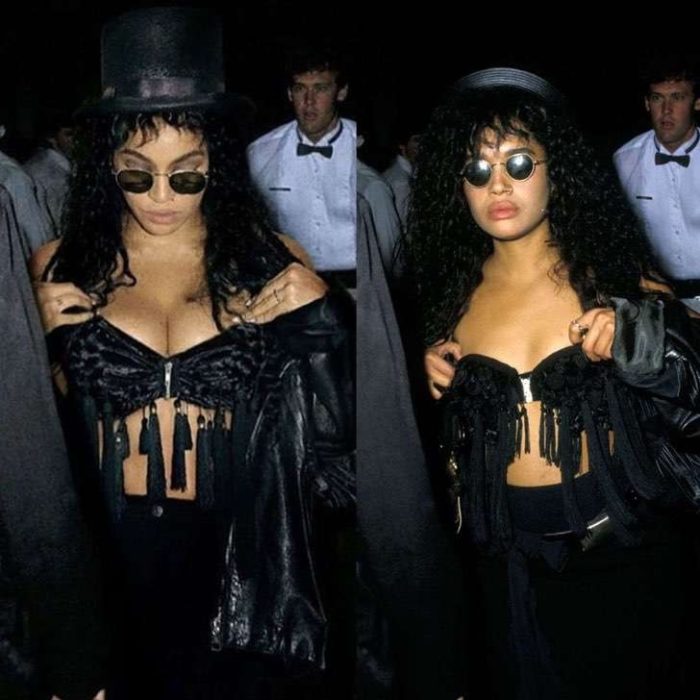 Beyoncé disfrazada como Lisa Bonet con crop top negro y flecos, con sombrero de copa negro y gafas oscuras