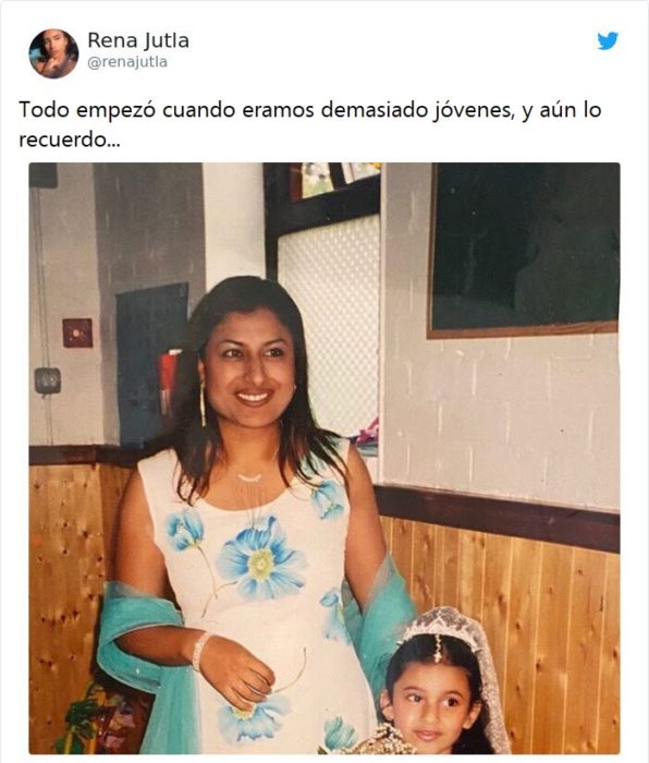 Tuit de respuesta con la foto de una niña abrazando a su maestra