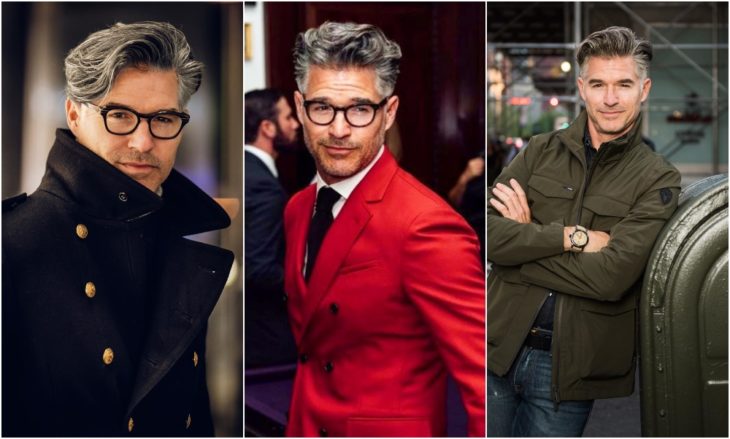 Eric Rutherford modelando un saco sastre en color rojo con corbata negra