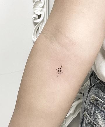Tatuaje de estrella de estrella en el brazo