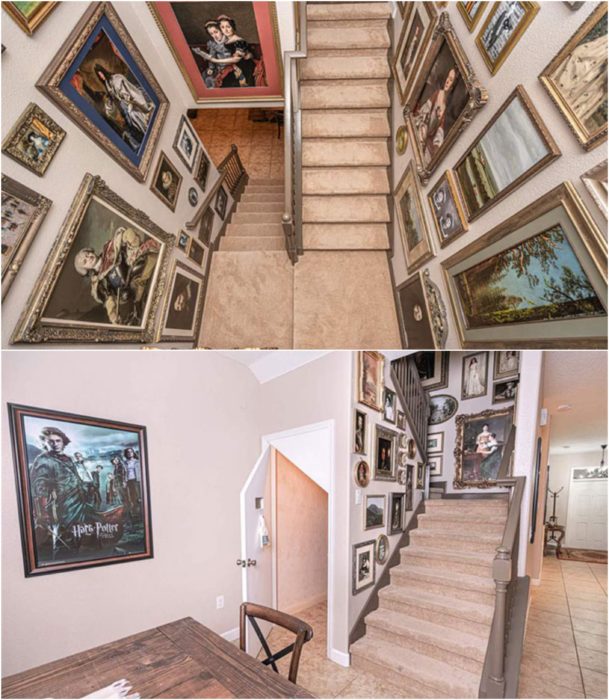 Pasillo con escaleras decoradas con cuadros antiguos y posters de Harry Potter