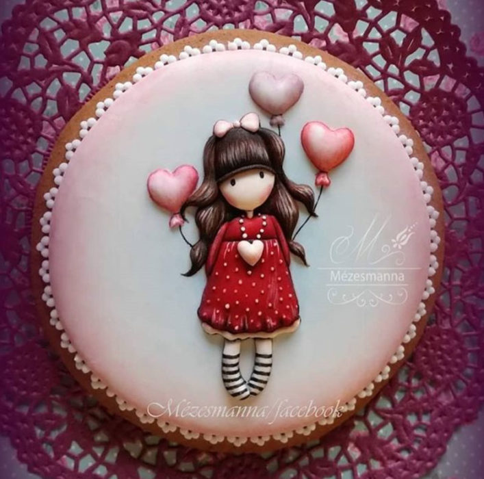 Galleta de jengibre decorada con una niña en forma de caricatura