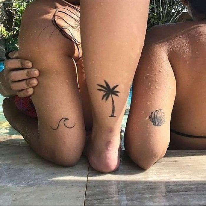 Tatuaje de hermanos de elementos de playa