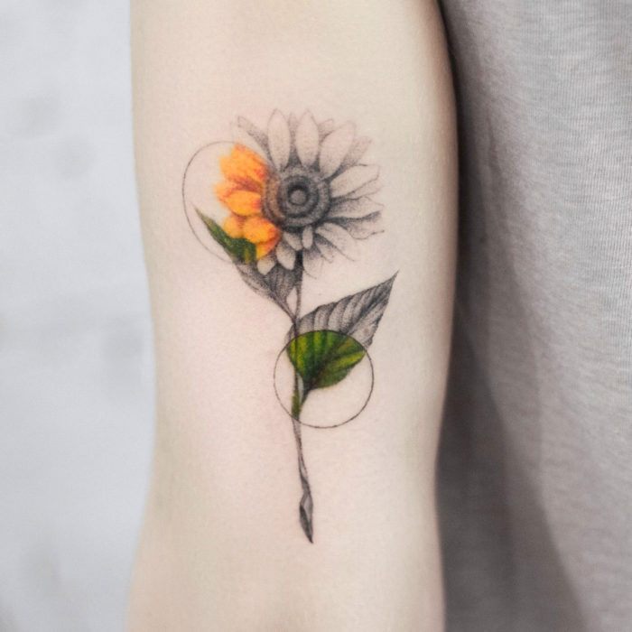 Tatuaje de girasoles en el brazo