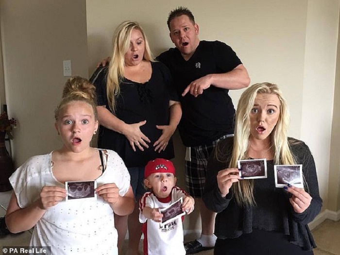 April y su familia cuando supieron que estaba embarazada de cuatrillizos