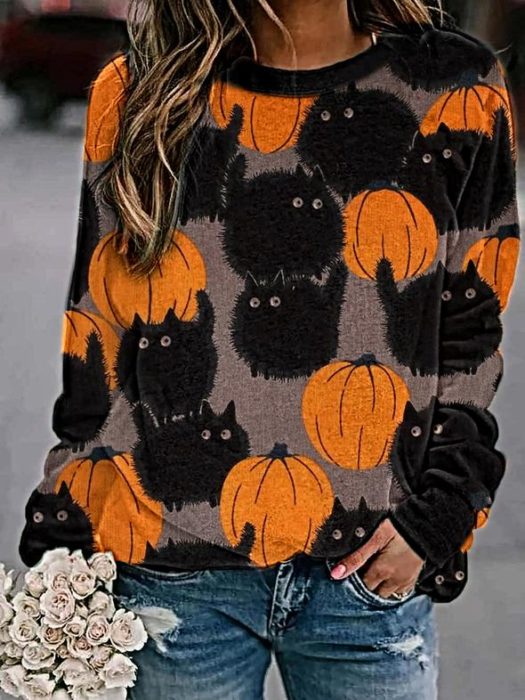 Suéter inspirada en Halloween con estampado de calabazas y gatos negros