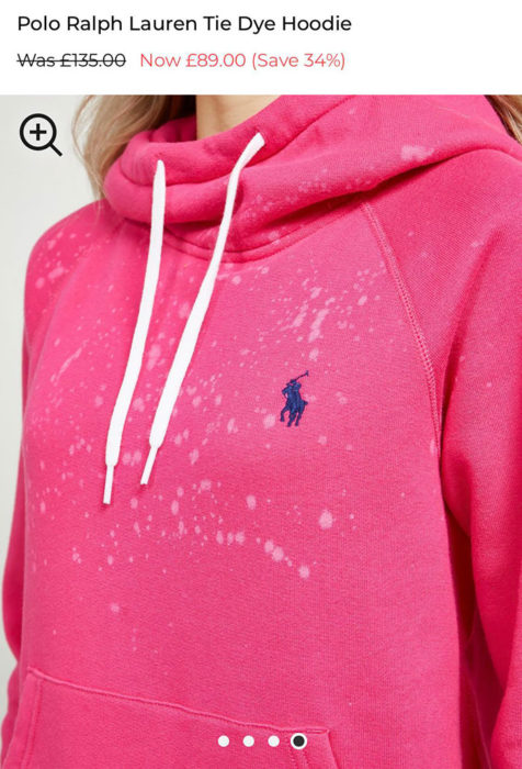 Sudadera de color rosa con manchas de detergente 