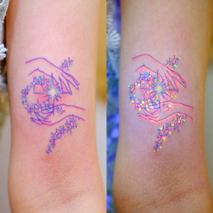 Tatuadora hace tatuajes bonitos, delicados y femeninos que brillan; tatuaje de manos con estrellas color rosa y azul pastel