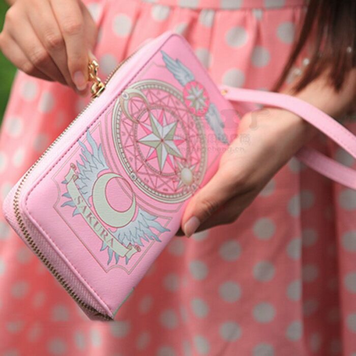 Cartera de mano en color rosa inspirada en sakura card captor