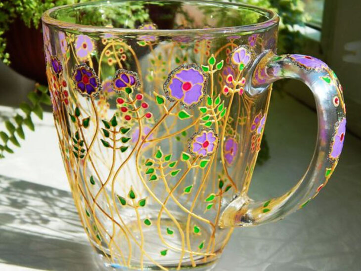 Taza para tomar el té, transparente con detalles de flores 