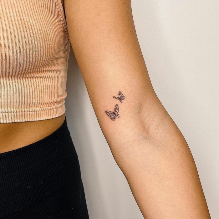 tatuajes pequeños de mariposas en el brazo