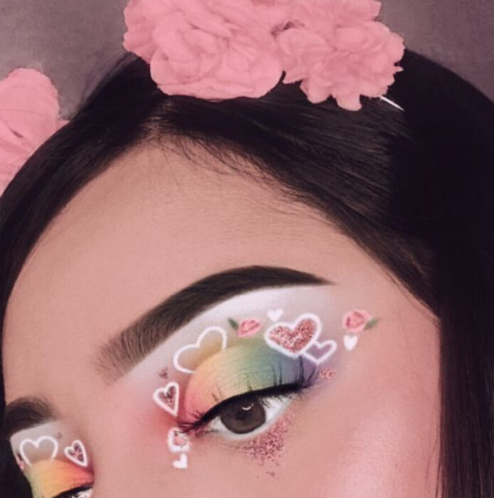 Maquillaje inspirado en San Valentín en colores pastel y blanco, con decorado de corazones