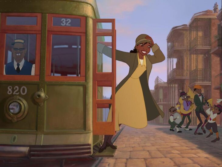 Tiana de la princesa y el sapo viajando en tren 