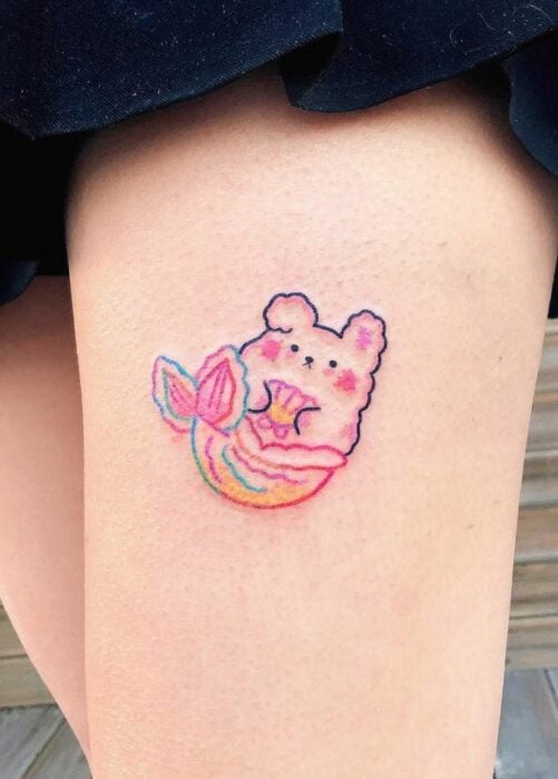 tatuaje en forma de conejo con cola de sirena; Tatuajes con diseños kawaii para niñas bien