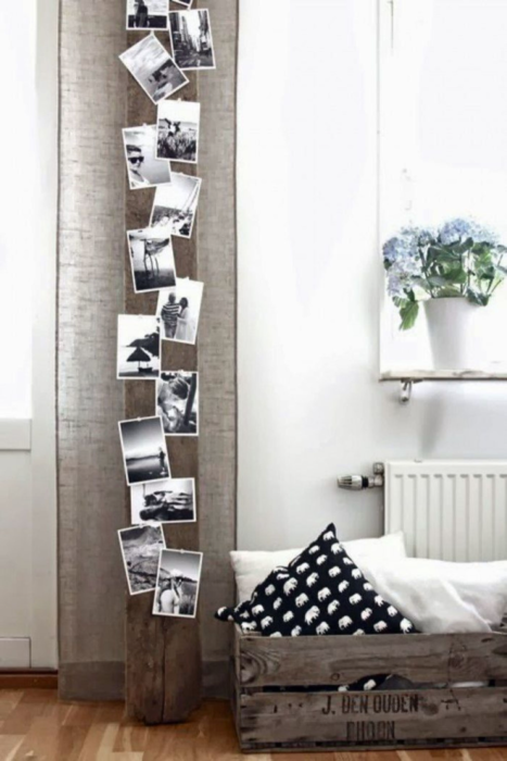 Decoración con fotos instax pegadas a la pared y acompañadas con luces