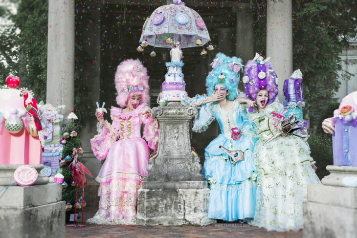 Girls in a photo shoot dressed as Marie Antoinette 