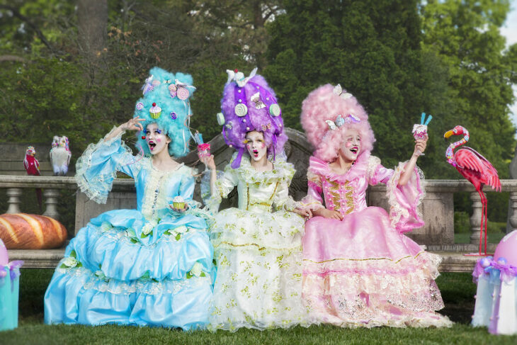 Girls in a photo shoot dressed as Marie Antoinette 