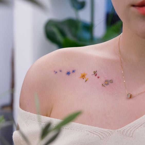 Tatuaje en el hombre con flores ;18 Tatuajes botánicos para hacer de tu piel un jardín secreto