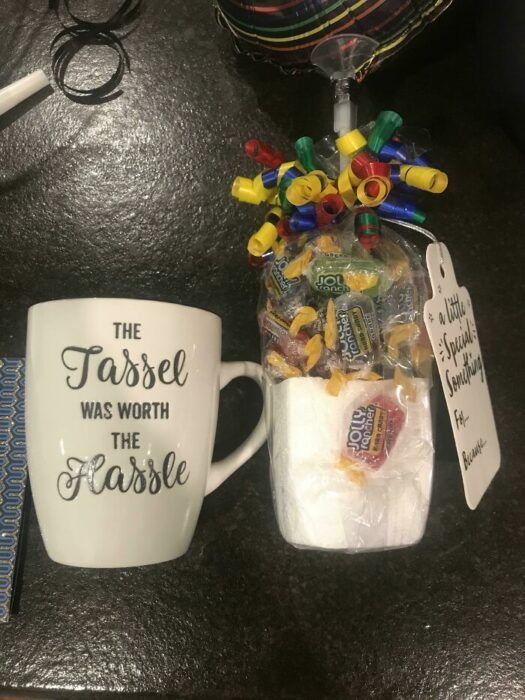 mug with chocolates; people who were scammed into buying fast food