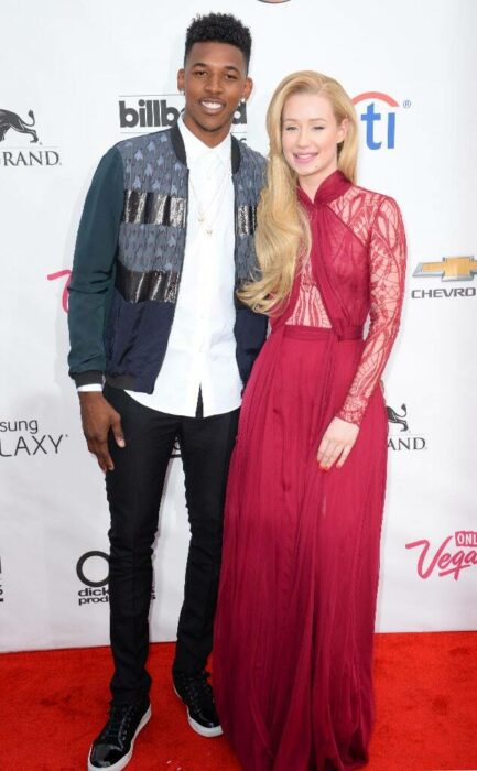 Iggy Azalea and Nick Young posing separately for a photo  