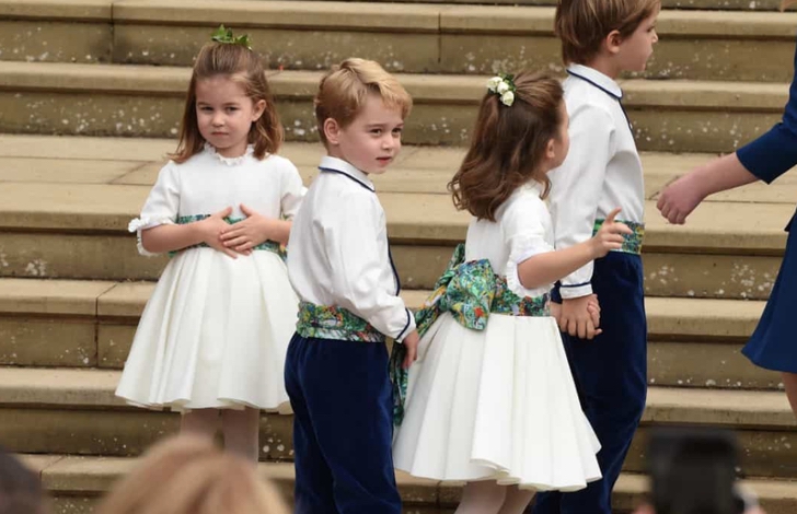 Royal children wearing very similar dresses 