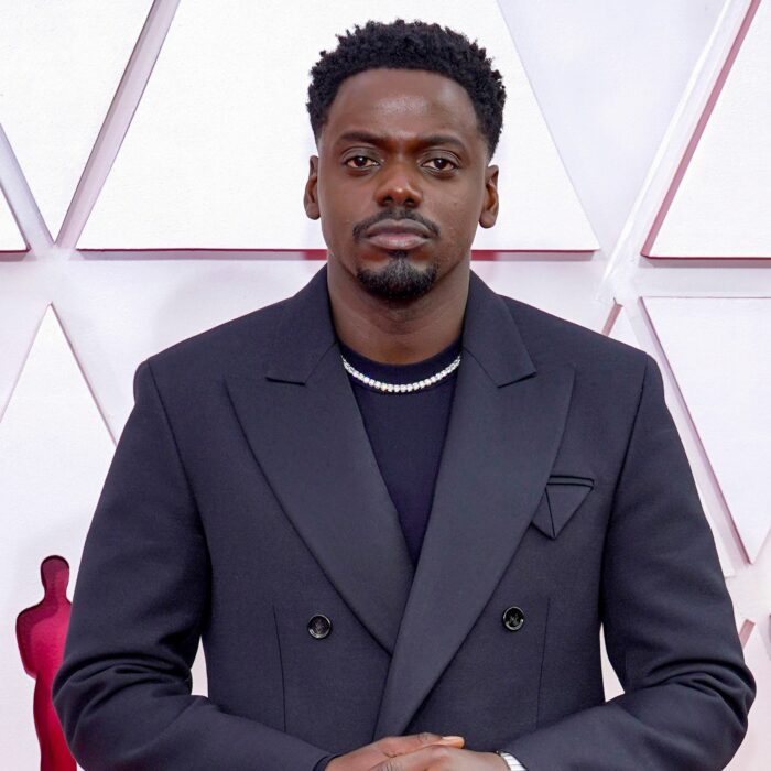 Daniel Kaluuya posing for a photo on a red carpet 