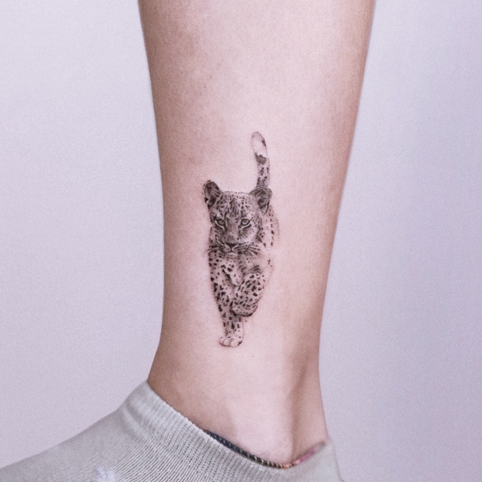 different original designs inspired by the zodiac sign Leo, black ink, with lions, stars, constellation
