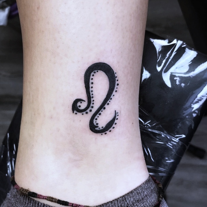 different original designs inspired by the zodiac sign Leo, black ink, with lions, stars, constellation