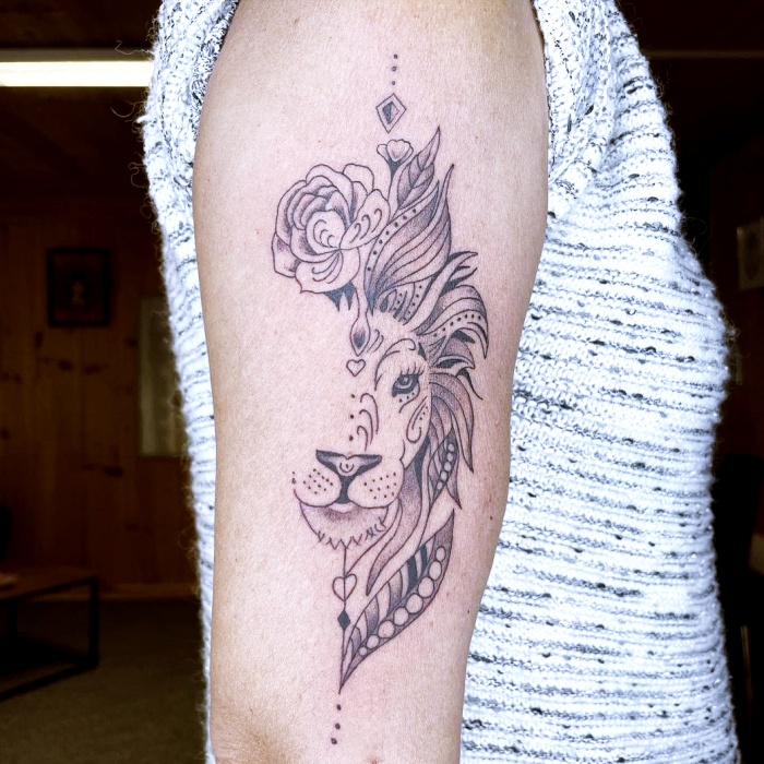 different original designs inspired by the zodiac sign Leo, black ink, with lions, stars, constellation