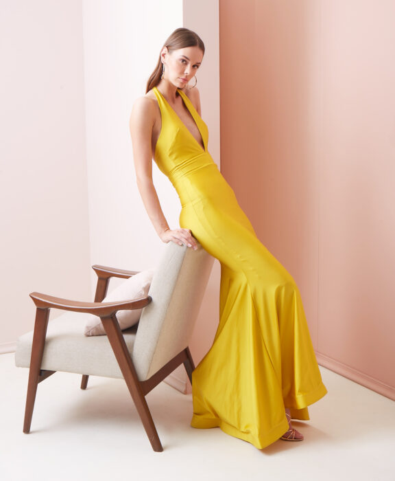 Girl posing in a yellow dress 