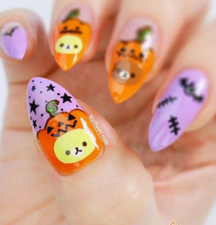 Manicura estilo cute con calabazas; 18 Manicuras a las que tu brujita interior no se resistirá