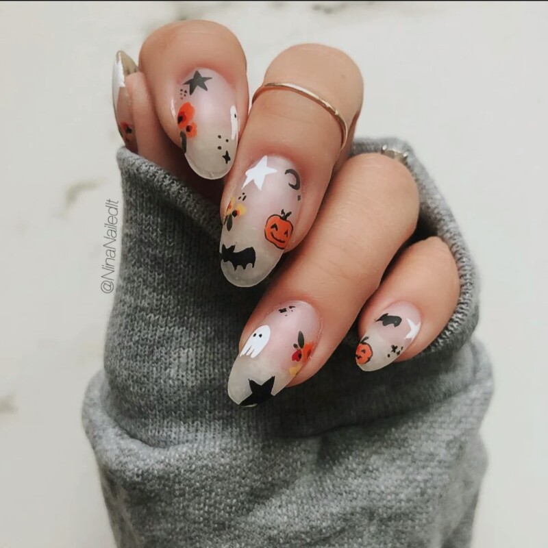 Manicure with zucchini and bats;  18 Manicures Your Inner Witch Won't Resist