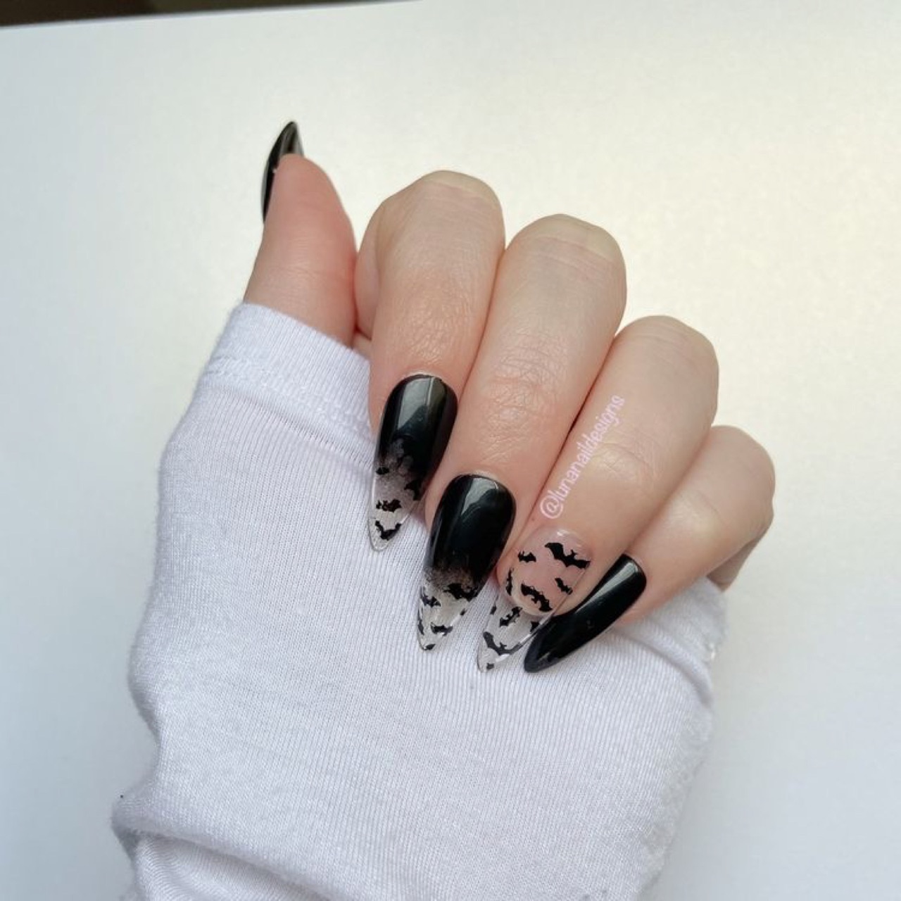 Manicure with bats;  18 Manicures Your Inner Witch Won't Resist