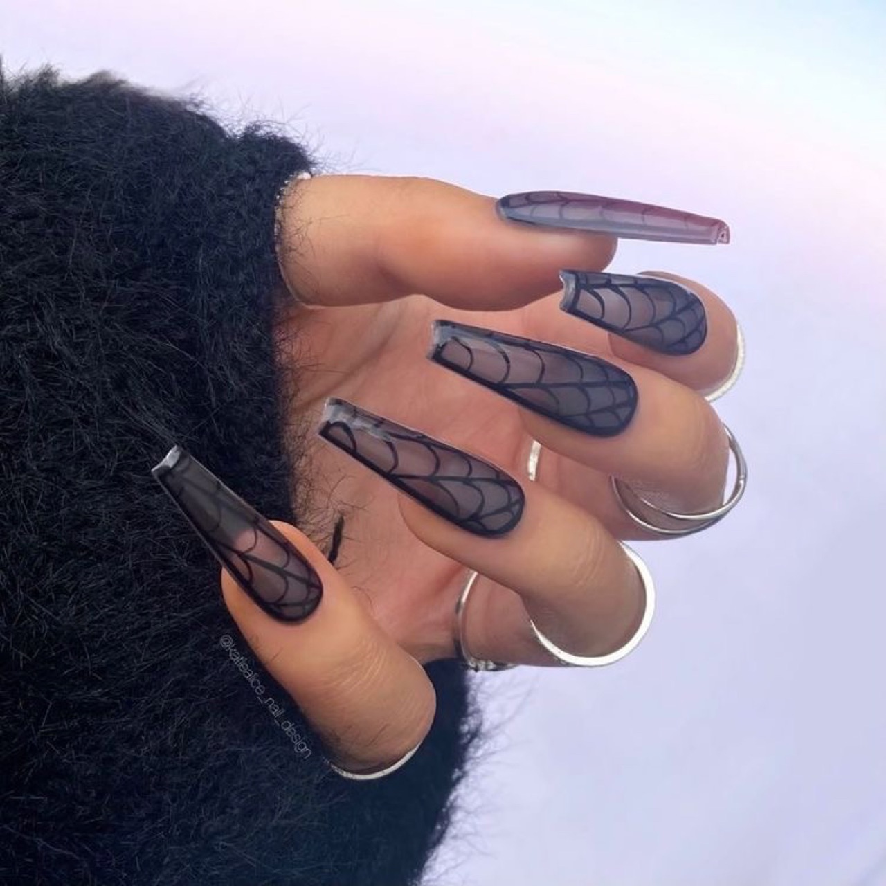 Manicure with black cobweb;  18 Manicures Your Inner Witch Won't Resist