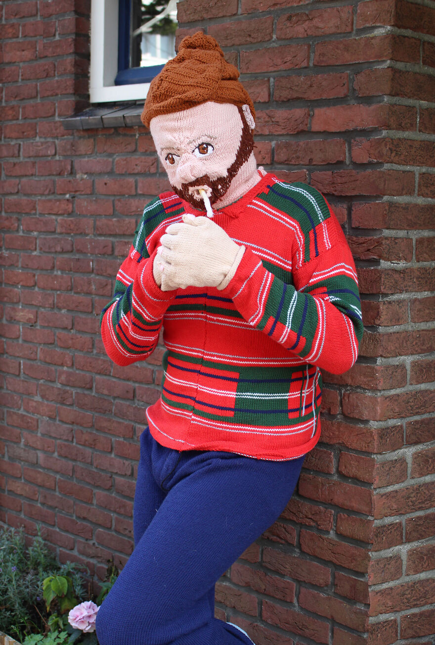 Smoking knitted vest;  Woman weaves her husband and son in life size