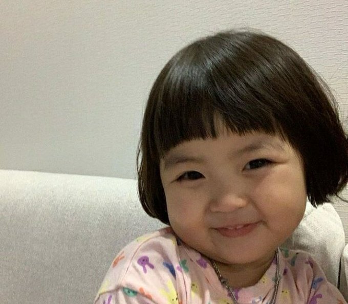 Rohee posing for a photograph 