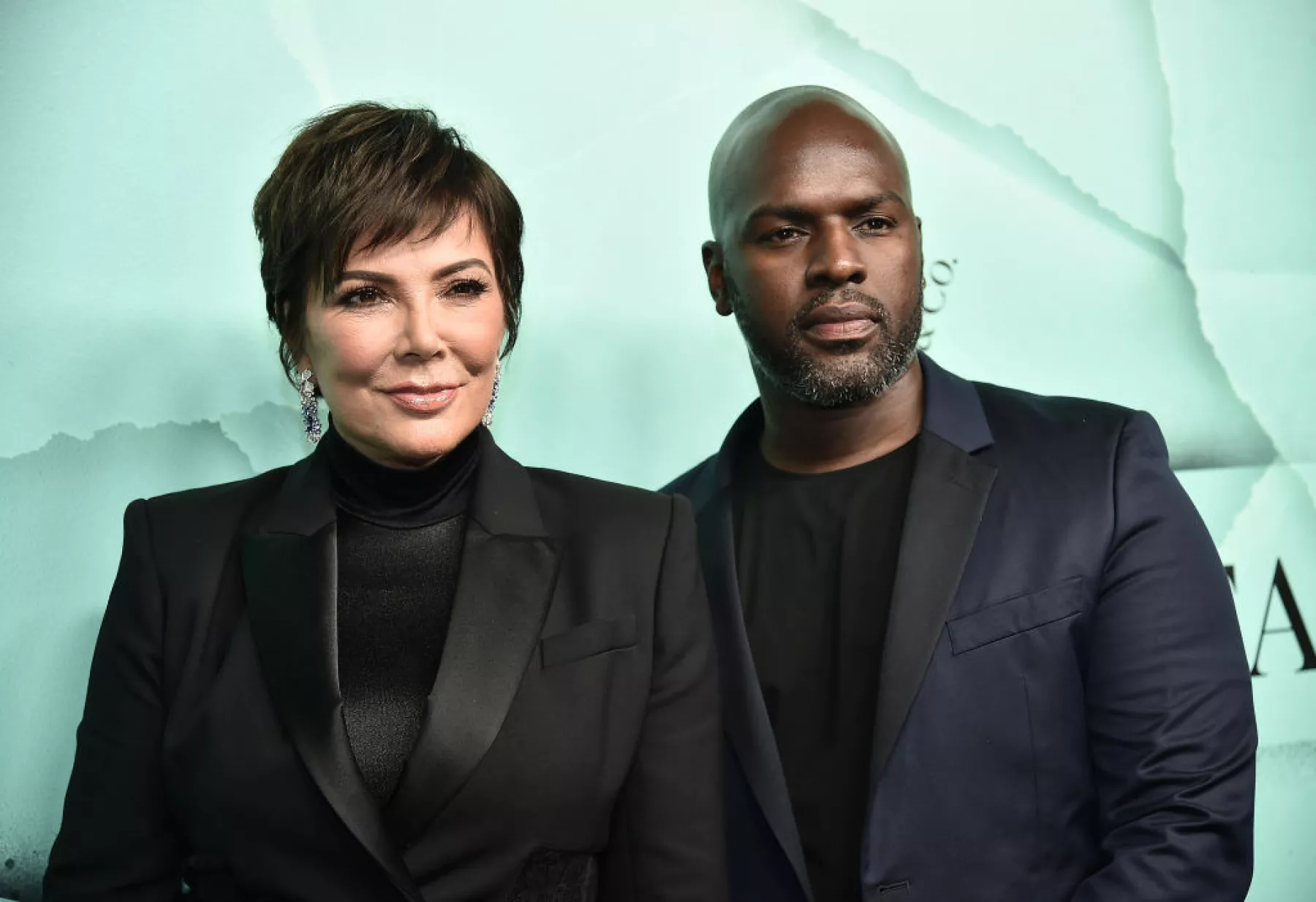 Corey Gamble and Kris Jenner;  Kim Kardashian debuts on 'SNL' with an irreverent monologue that made the internet laugh