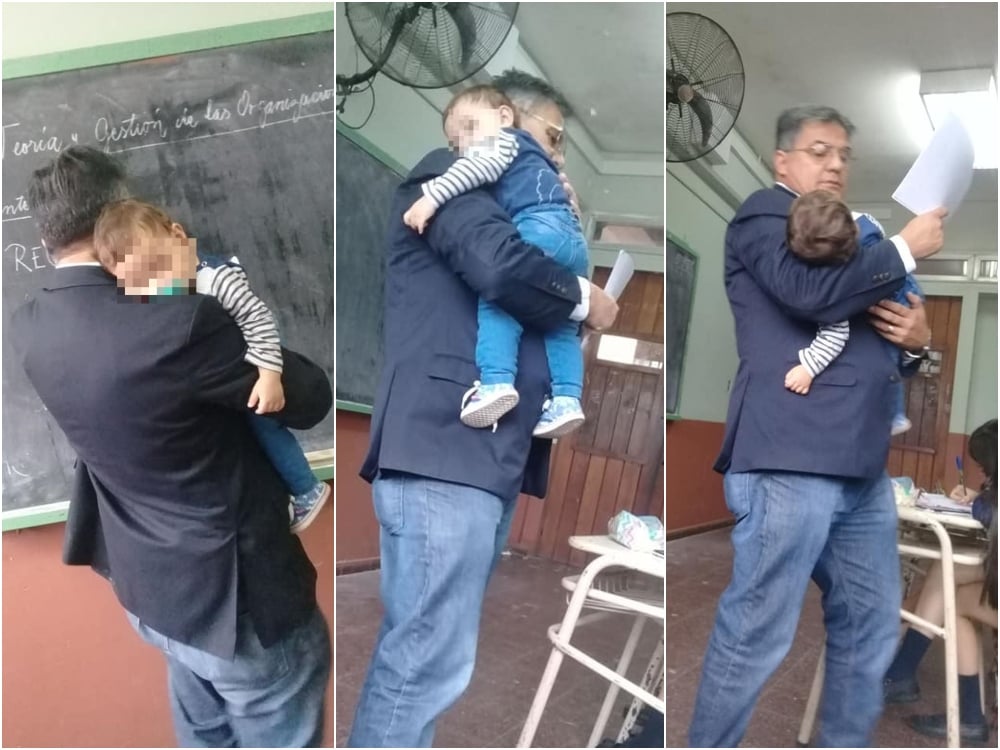 Profesor cargando a un niño; Profesor cuida del bebé de su alumna para que pueda tomar su clase