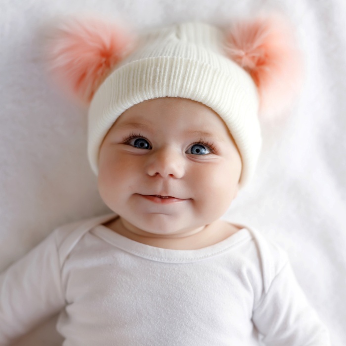 adorable baby girl with blonde, dark, brown hair