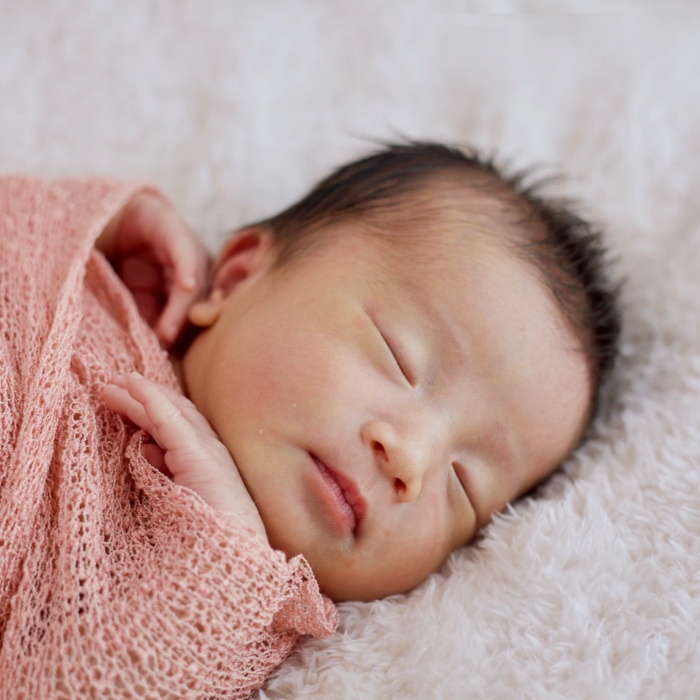 adorable baby girl with blonde, dark, brown hair