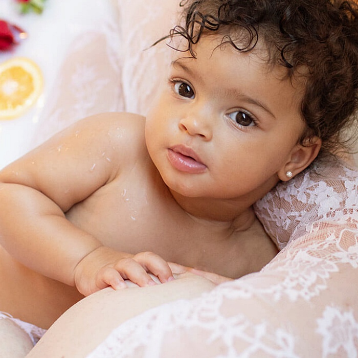 adorable baby girl with blonde, dark, brown hair