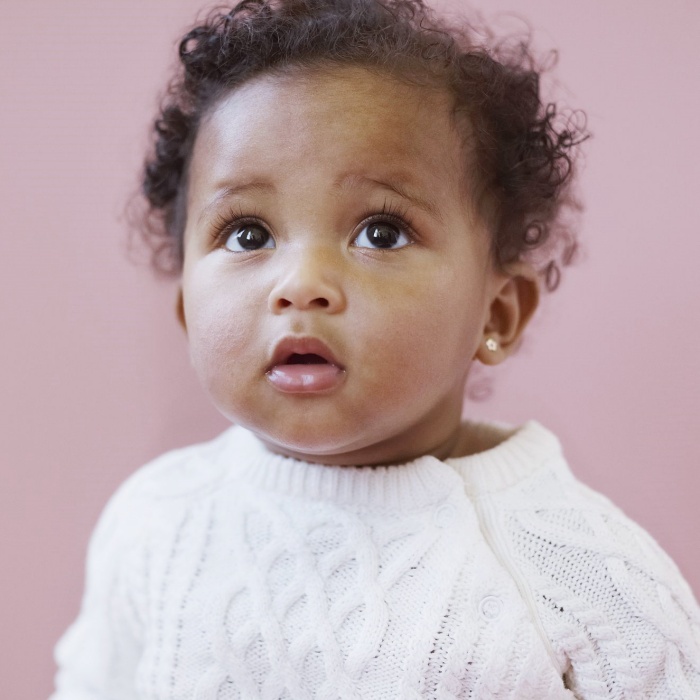 adorable baby girl with blonde, dark, brown hair