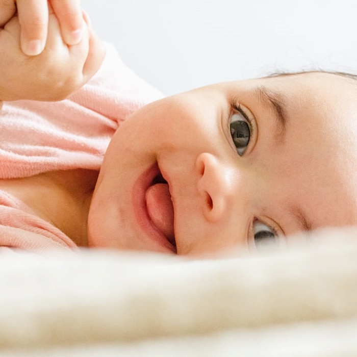 adorable baby girl with blonde, dark, brown hair