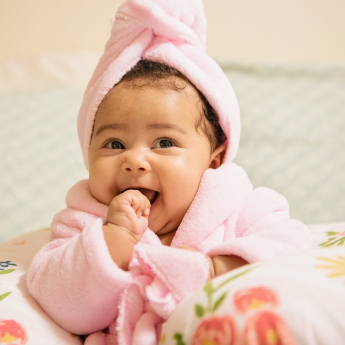 adorable baby girl with blonde, dark, brown hair