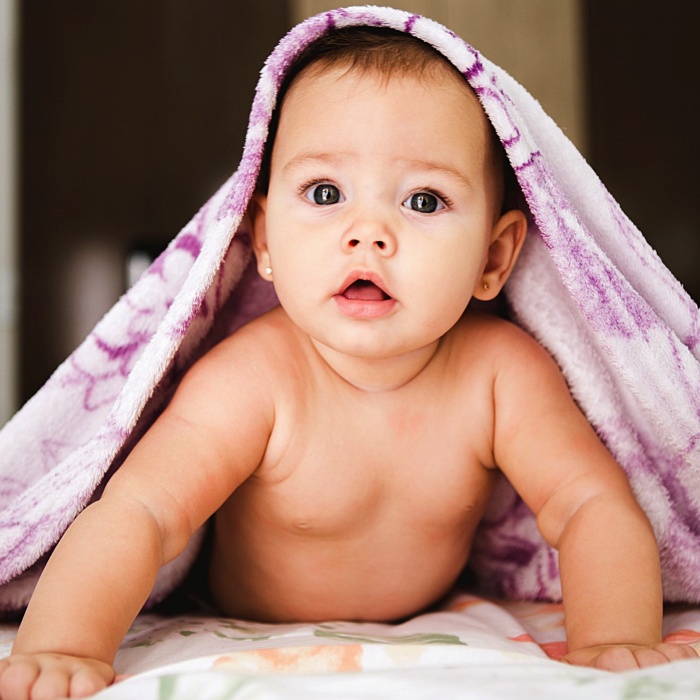 adorable baby girl with blonde, dark, brown hair