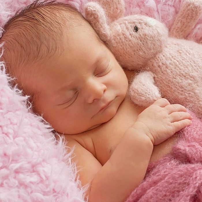 adorable baby girl with blonde, dark, brown hair