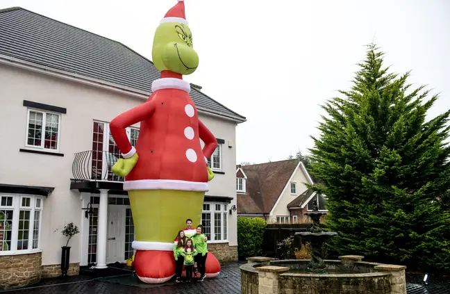 He buys an inflatable Grinch for his daughter and the doll is bigger than his house